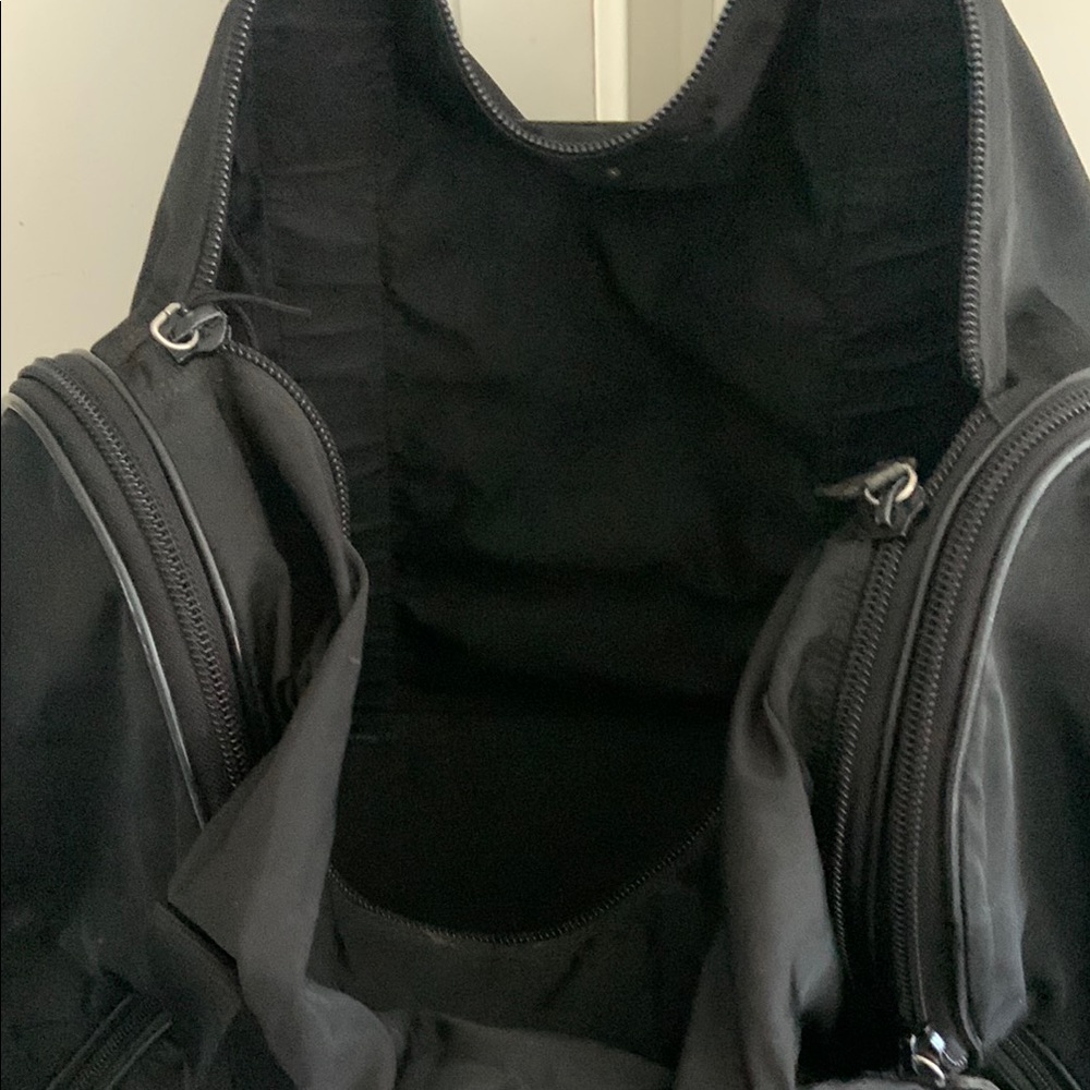 Prada Black Duffel Bag with Sleek Design and Versatile Use - Picture 4 of 5